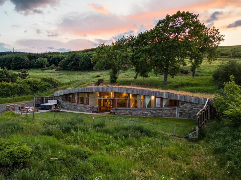 a stone house in the middle of a field at 3 Bed in Kinross oc-55935 in Kinross