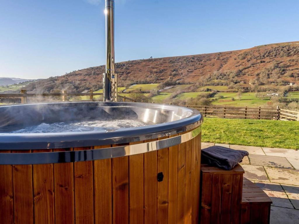 a jacuzzi tub with a water fountain at 3 Bed in Crickhowell oc-90757 in Cwm-du