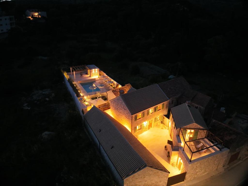 an aerial view of a house at night at Villa Maranta in Slano