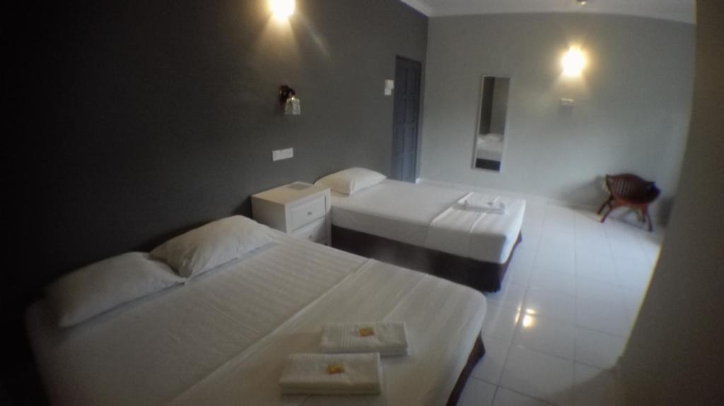 TEBiNG Guest House Taman Negara Malaysia Kuala Tahan - Tripla Stanza Standard
