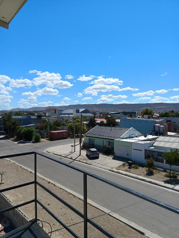 a view of a city from a balcony at Espacio Pueyrredón in Comodoro Rivadavia
