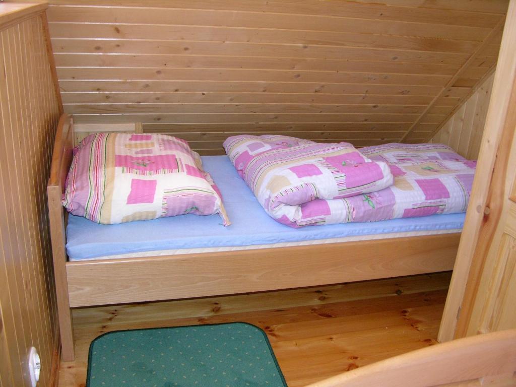 Postel nebo postele na pokoji v ubytování Domki Letniskowe Edi