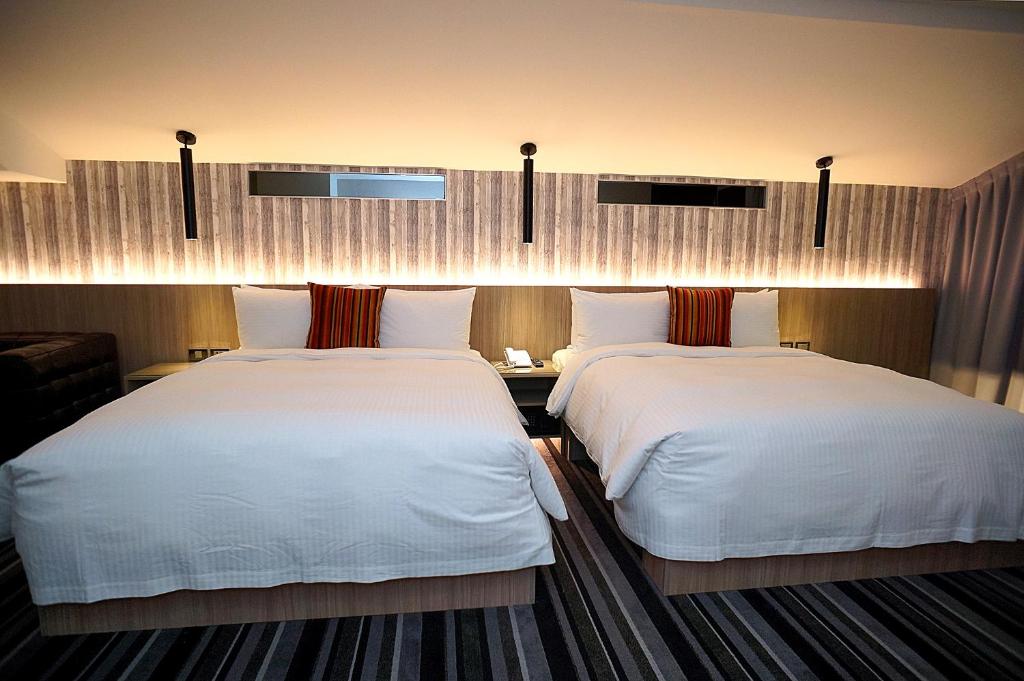 Postel nebo postele na pokoji v ubytování Via Hotel - Zhongxiao