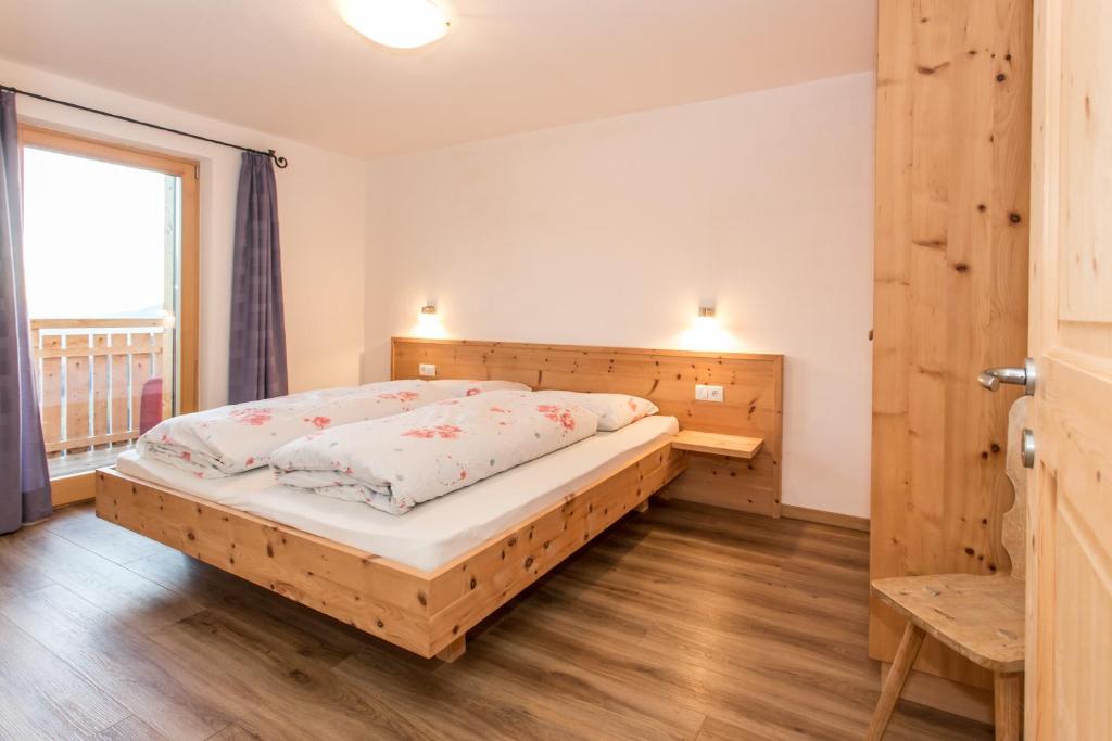 Postel nebo postele na pokoji v ubytování Zolerhof