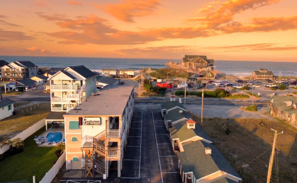 an aerial view of a small town with the ocean at Sea Horse Inn and Cottages in Nags Head