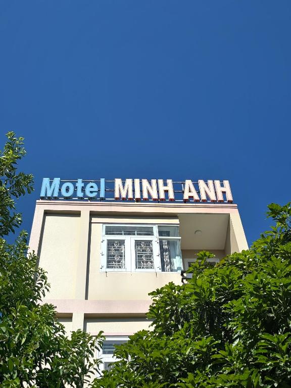 a building with a sign on top of it at Nhà Minh Anh in Vung Tau