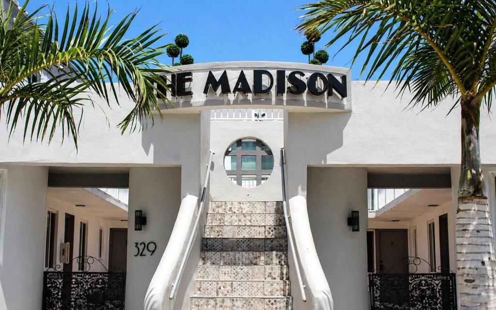 a building with a sign that reads the madison at The Madison by the Gold Nests in Hollywood