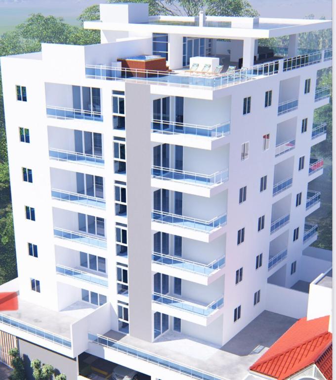 an aerial view of a white apartment building at Little friend #1 Two balconies,elevator in Boca Chica