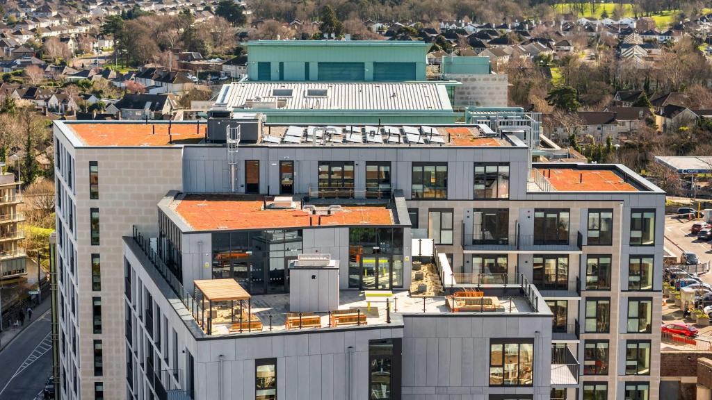 an aerial view of a building with an orange roof at Apex Executive Apartments - The Ironworks in Dublin