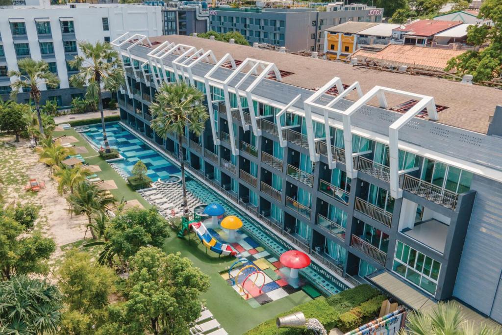 an aerial view of a hotel with a swimming pool at Sugar Marina Hotel - ART - Karon Beach in Karon Beach