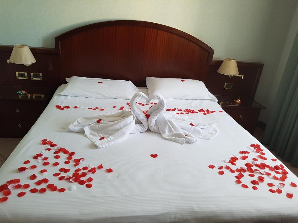 Postel nebo postele na pokoji v ubytování Venice Palace Hotel