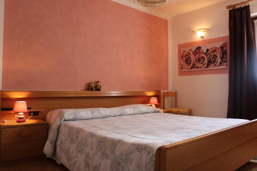 Posteľ alebo postele v izbe v ubytovaní Residence Capriolo