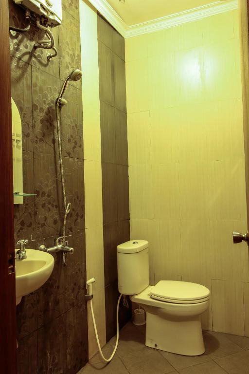 Koupelna v ubytování Griya Langen Guesthouse