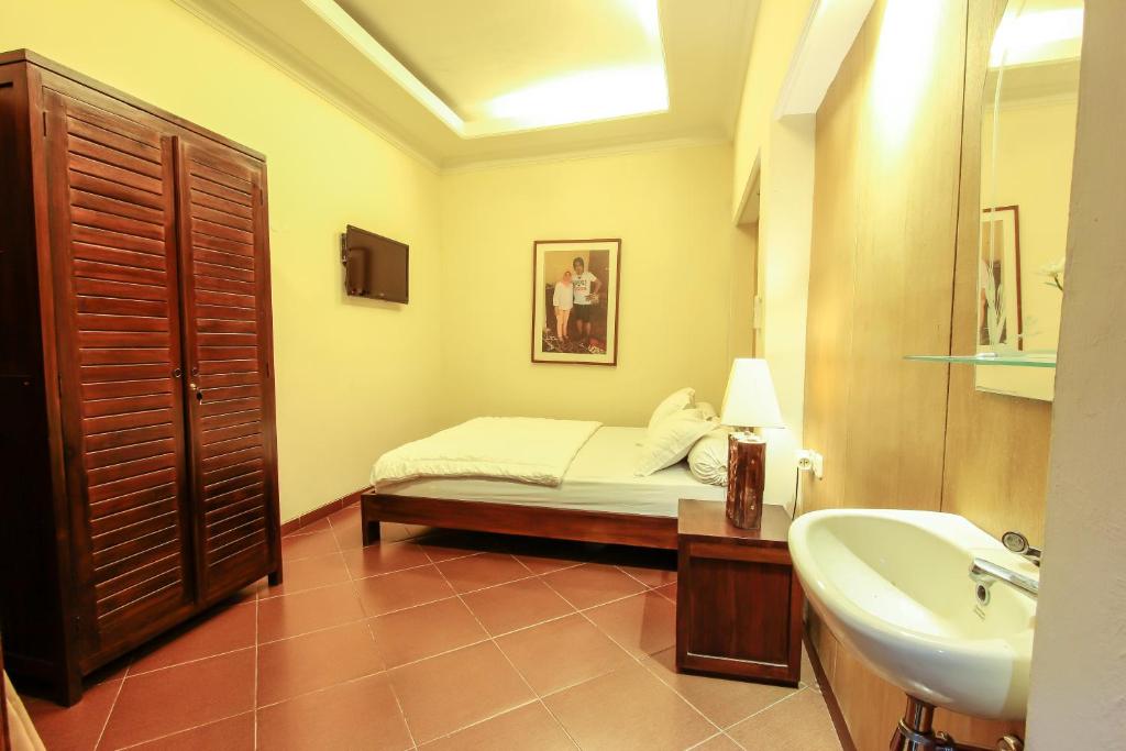 Koupelna v ubytování Griya Langen Guesthouse
