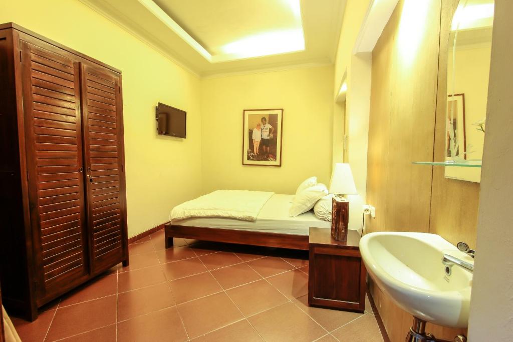 Koupelna v ubytování Griya Langen Guesthouse