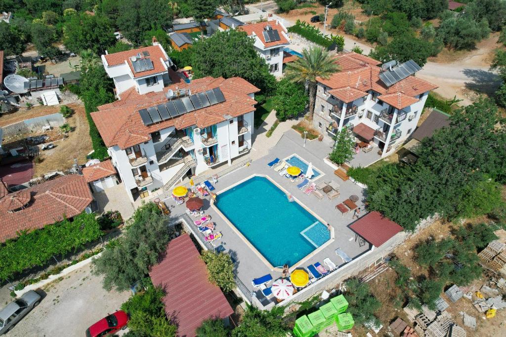an aerial view of a house with a swimming pool at Köseoğlu Apart Villa in Fethiye