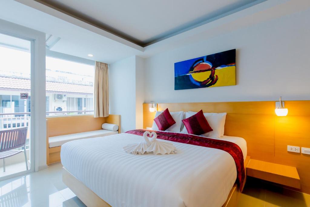 Postel nebo postele na pokoji v ubytování Aspery Hotel - SHA Certified