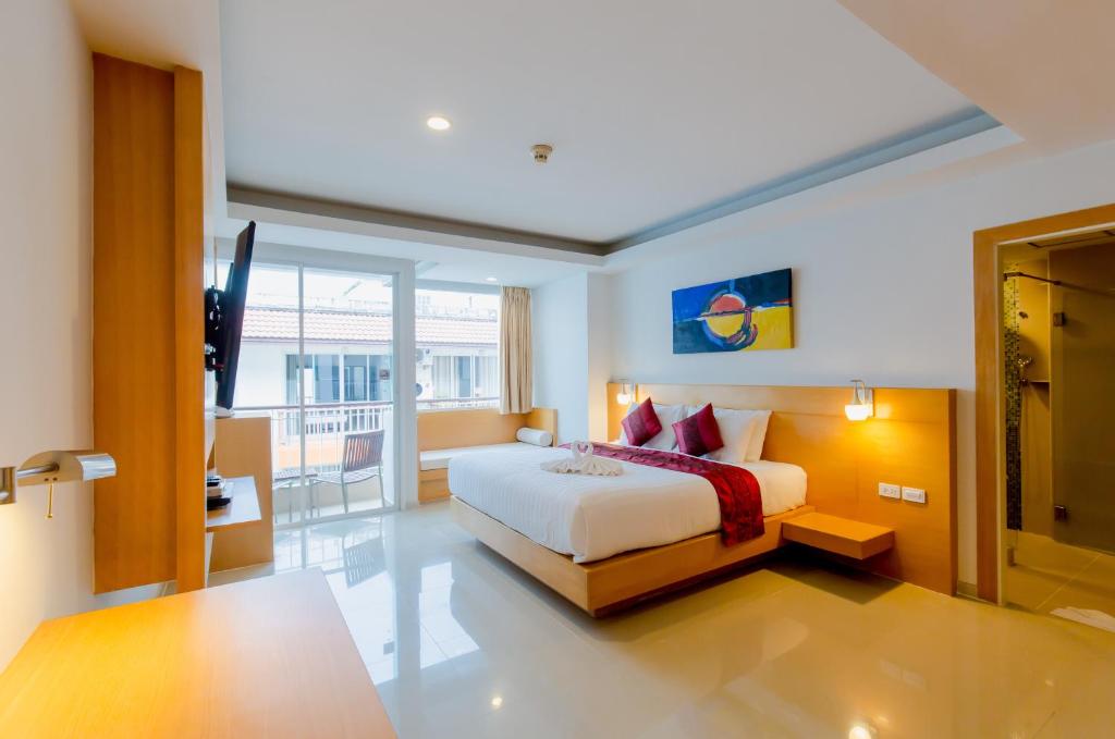 Postel nebo postele na pokoji v ubytování Aspery Hotel - SHA Certified