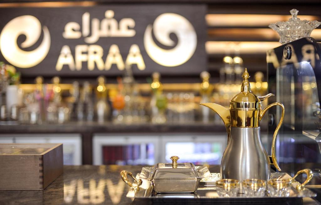 Lounge nebo bar v ubytování Afraa Hotel Al Aziziya