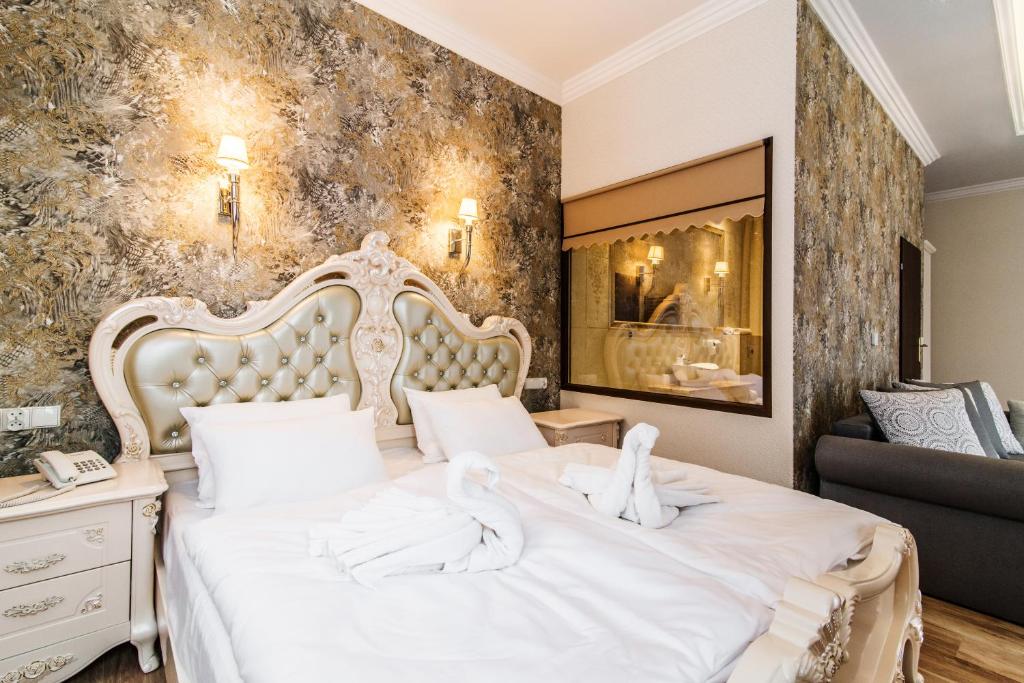 Postel nebo postele na pokoji v ubytování Pałac Margot Nature&SPA