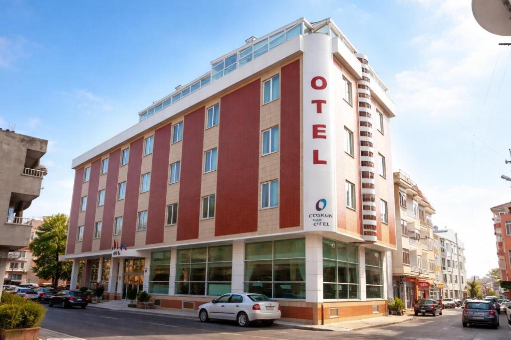 a building with a hotel sign on the side of it at Coskun Otel Şarköy in Şarköy