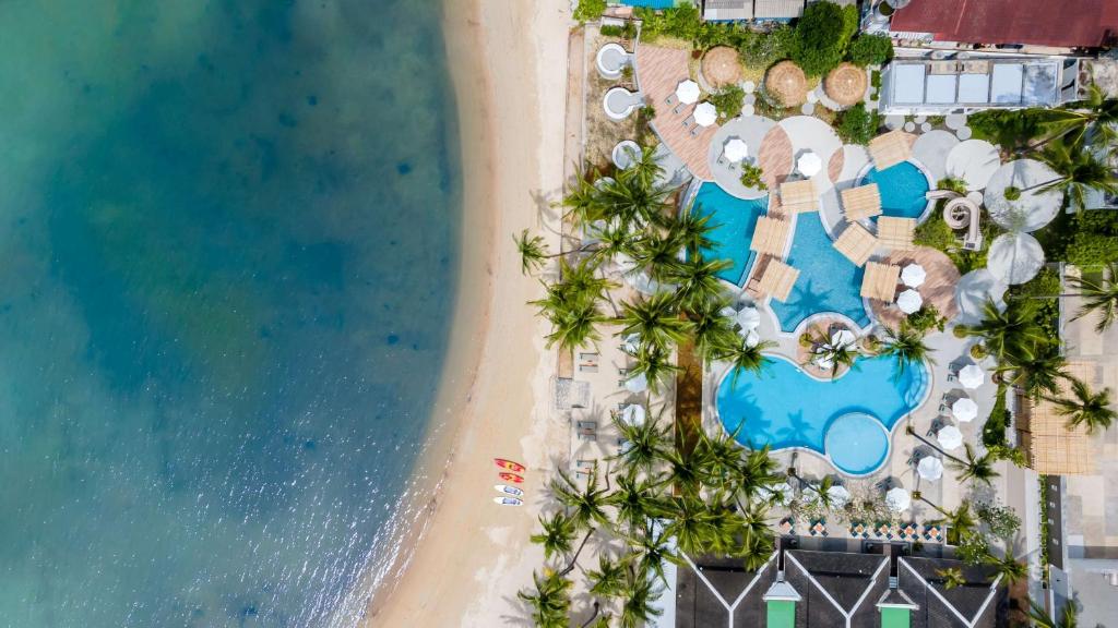 an aerial view of the resort and the beach at OUTRIGGER Koh Samui Beach Resort in Lamai
