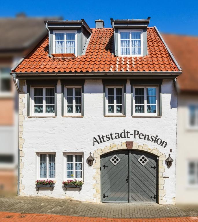 a rendering of a white building with akritick permission at Altstadt Pension Vlotho in Vlotho