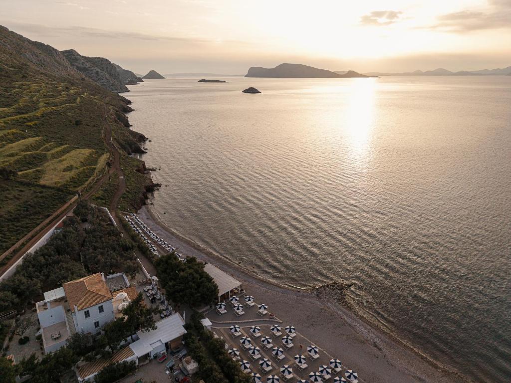 an aerial view of a beach and the water at Bellevalia Hydra in Hydra