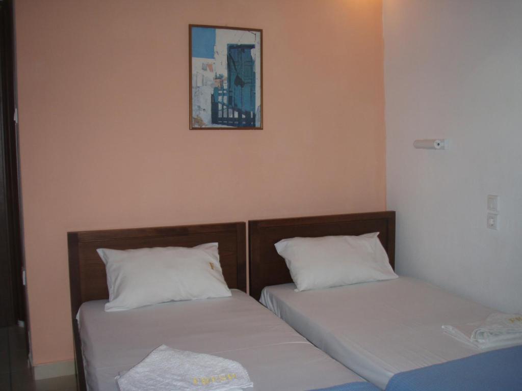 Postel nebo postele na pokoji v ubytování Eros-Iros Portside Stays Skiathos