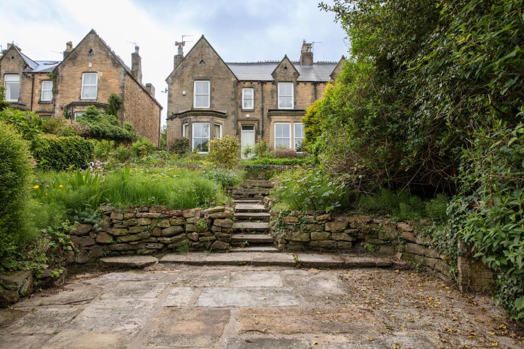an old stone path in front of a house at The Clarence in Bishop Auckland