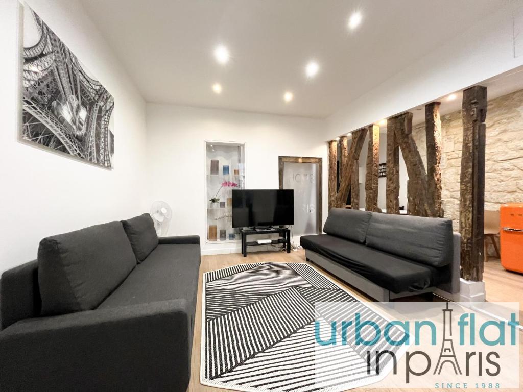 UrbanFlat 52 - Paris Center Fresh Apartment