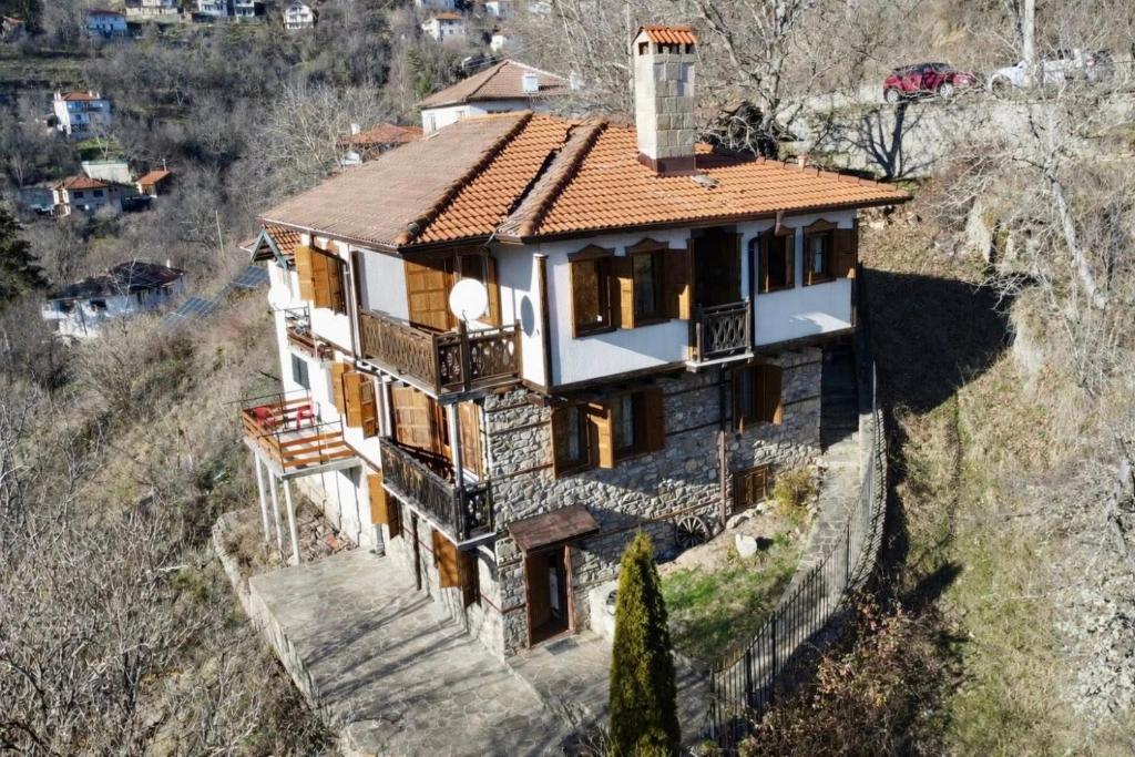 an aerial view of a house on a hill at Родопски Рай in Slaveino