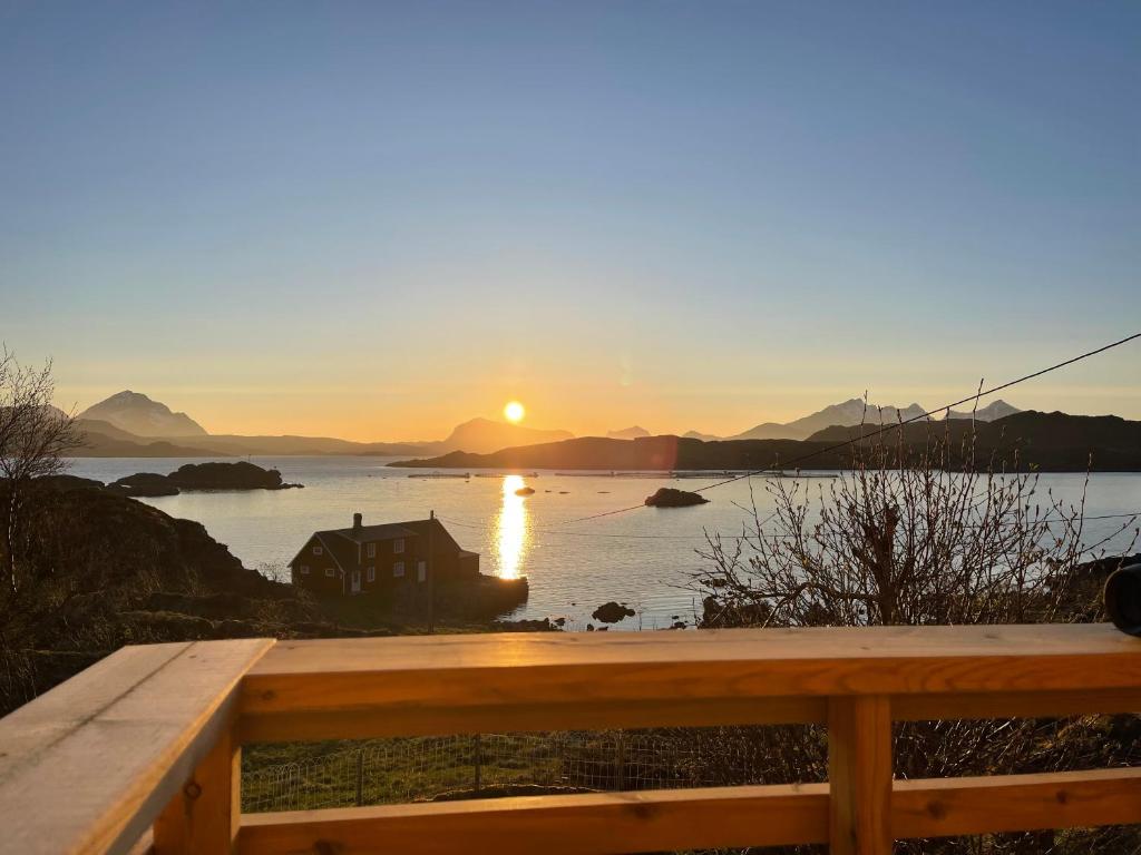 a sunset from the deck of a house at Sunyard House Lofoten in Leknes