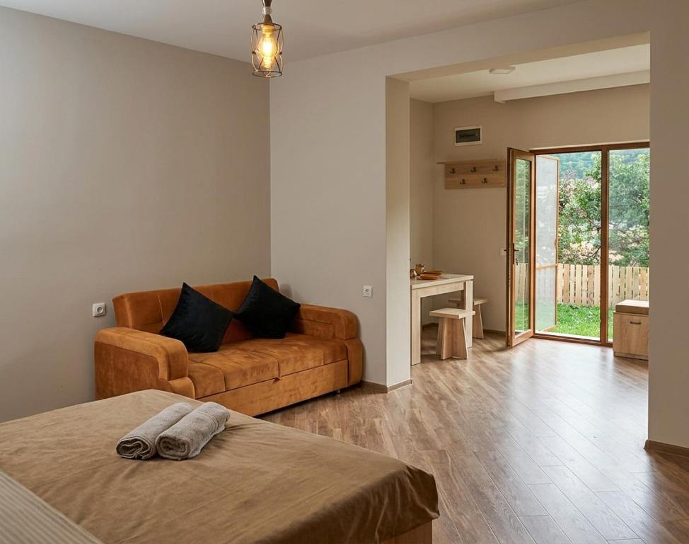 a large living room with a couch at Mountain Horizon in Borjomi