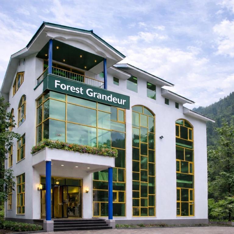 a building with a forest champion sign on it at Forest Grandeur Resort in Anantnāg