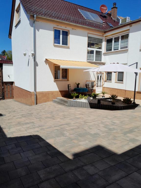 a patio in front of a house at Appartment Annika in Hochheim