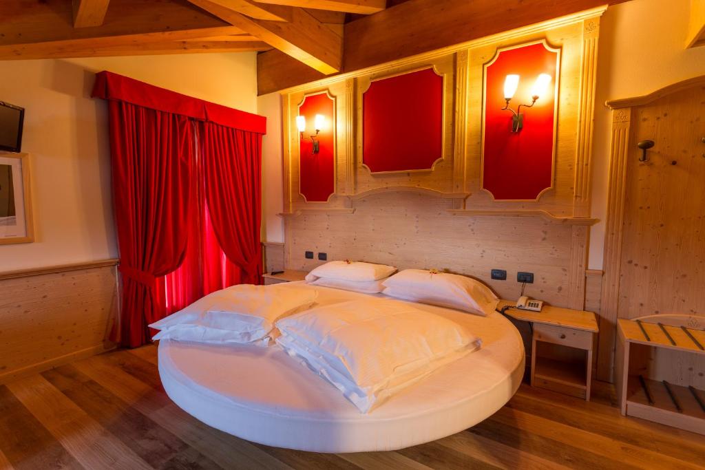 Postel nebo postele na pokoji v ubytování Hotel Arisch