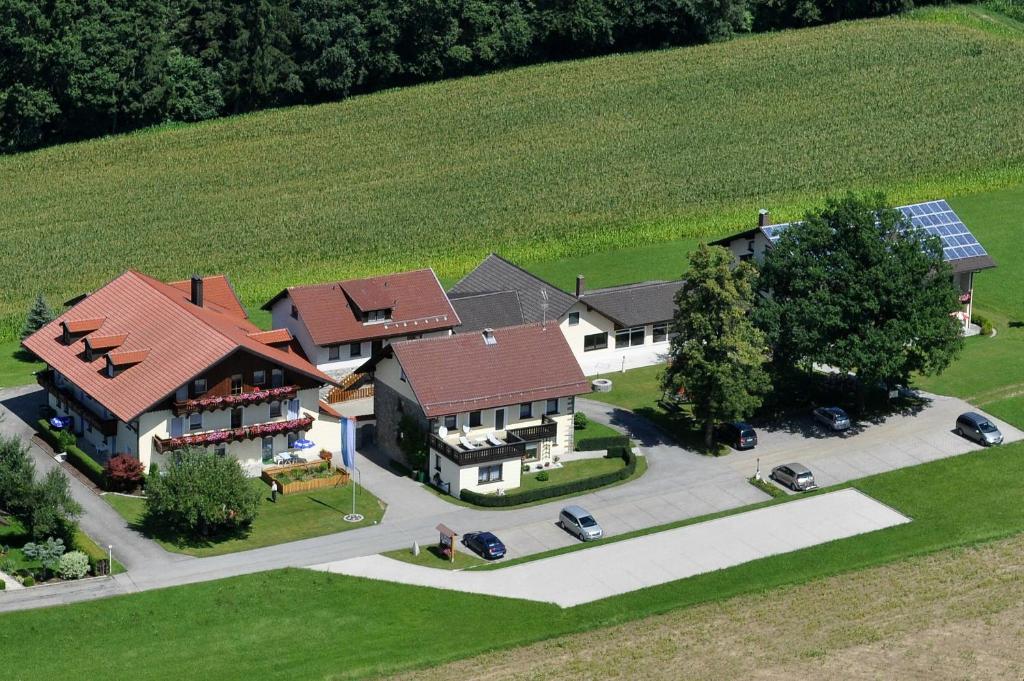an overhead view of a large house with a roof at Monteurzimmer Passau workers accommodation in Zwölfling