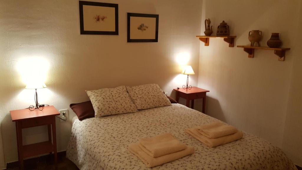 Postel nebo postele na pokoji v ubytování Casa San Nicolas