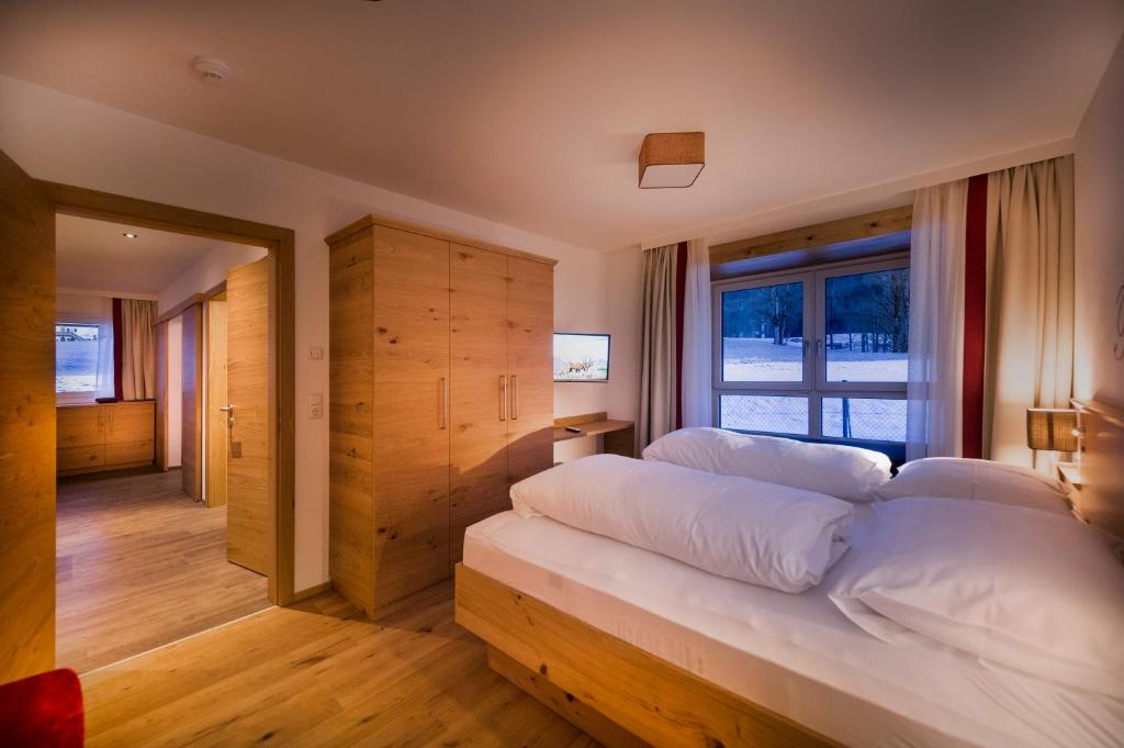 Posteľ alebo postele v izbe v ubytovaní Appartements Die Rifflerin