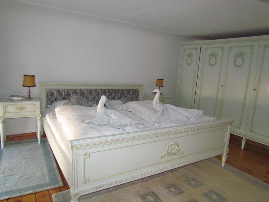 Postel nebo postele na pokoji v ubytování Casa Generalului