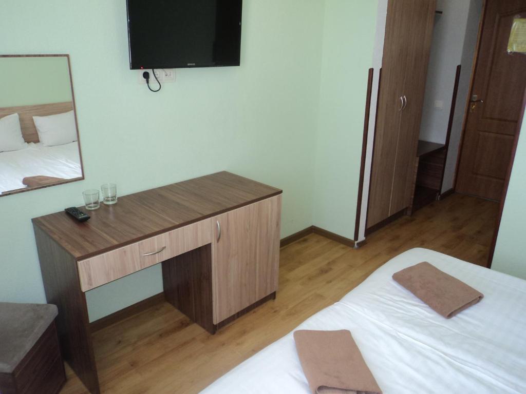 Postel nebo postele na pokoji v ubytování Hotel Restaurant Vizit