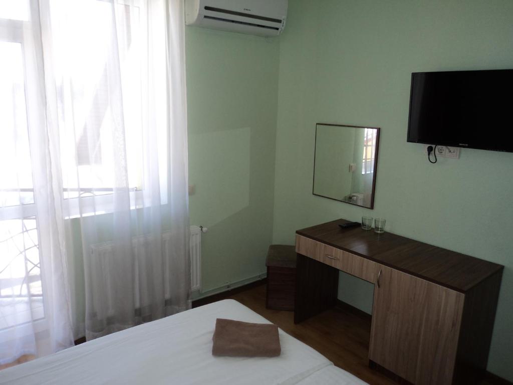 TV a/nebo společenská místnost v ubytování Hotel Restaurant Vizit