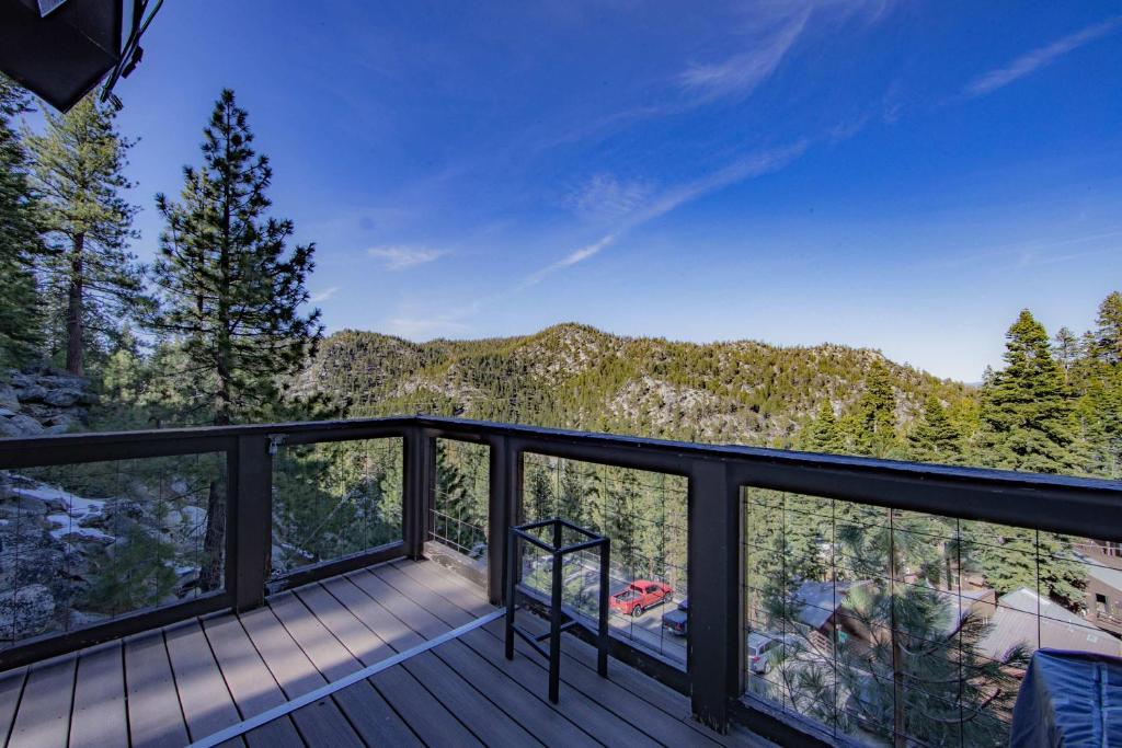 a balcony with a view of the mountains at Tramway Haus Mountain Views in Stateline