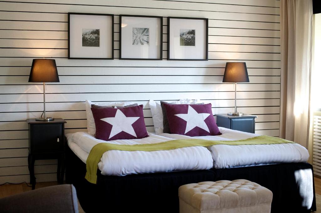 Postel nebo postele na pokoji v ubytování Hotell Tinget