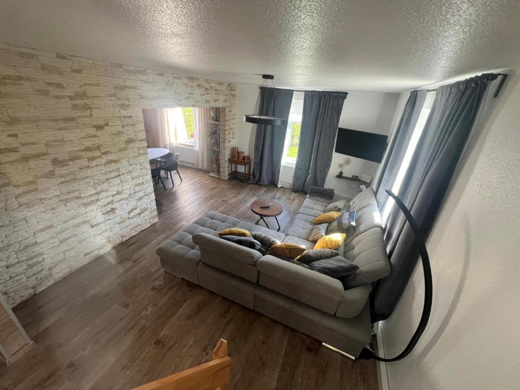 an overhead view of a living room with a couch at Aluxhaus in Heidenau