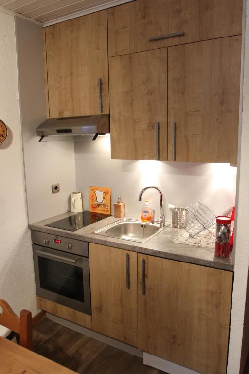 Kuchyň nebo kuchyňský kout v ubytování Appartement Chatel Centre