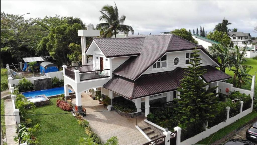 an aerial view of a house with a roof at Balay Pahuwai Bed & Breakfast in Tagaytay
