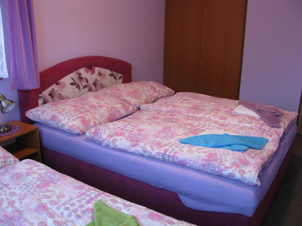 Postel nebo postele na pokoji v ubytování Boháček