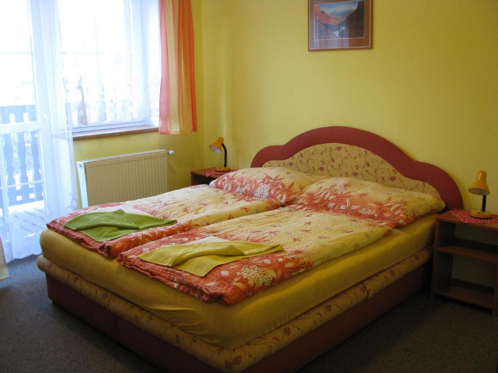 Postel nebo postele na pokoji v ubytování Boháček